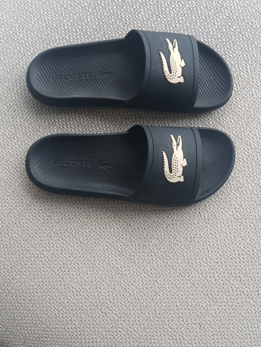 Lacoste Men's Black Slides with Gold Crocodile Accent